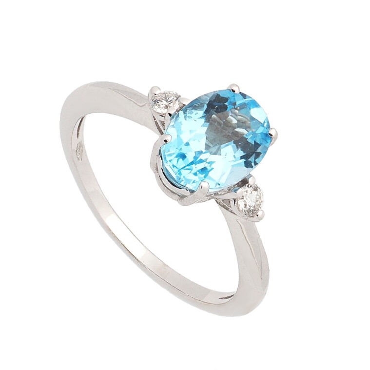 Anillo de oro blanco con topacios y diamantes Anillo de oro blanco con topacios y diamantes